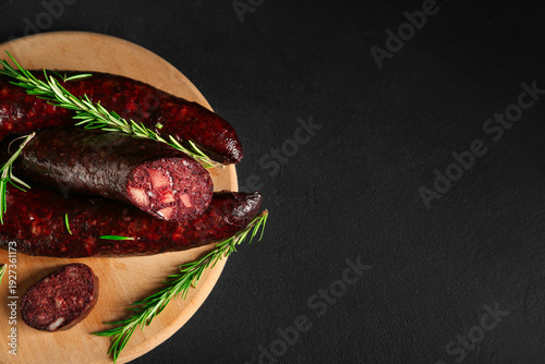 Tasty blood sausage on blac...
