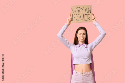Young woman with superhero ...