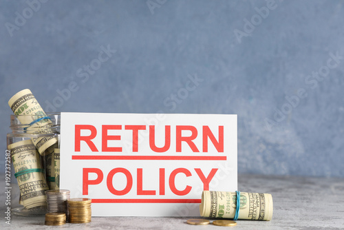 Paper with text RETURN POLI...
