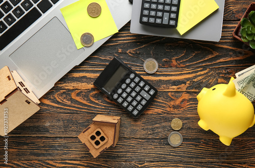 Calculator with house figur...