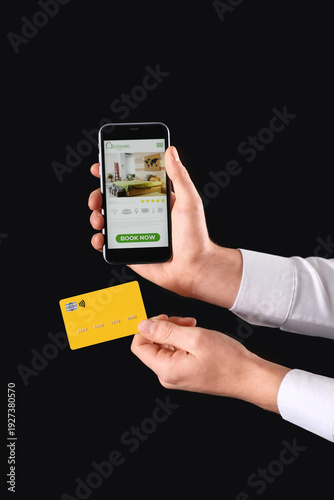 Man holding mobile phone wi...