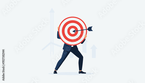 Businessman holding a large target with an arrow in the bullseye, symbolizing goal achievement, business success, strategic planning, and focused motivation for reaching corporate objectives.