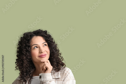 Thoughtful young woman look...