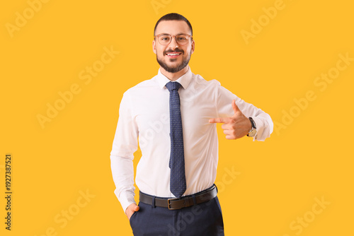 Young businessman pointing ...