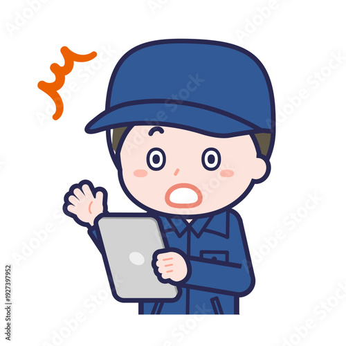 タブレットを使う「消防団員」の男性