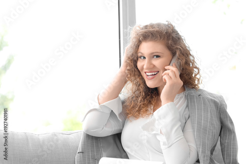 Young businesswoman sitting...