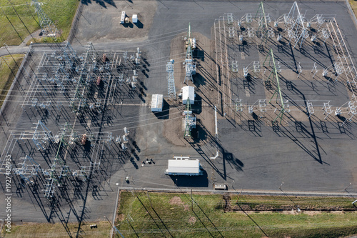 Quadro em tela Aerial drone picture of large electric power substation and high voltage power l