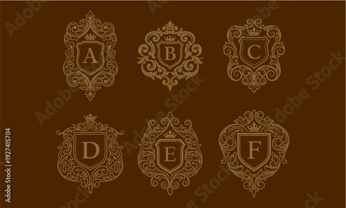 Ornate Monogram Shields with Letters A to F on a Brown Background in a Symmetrical Arrangement