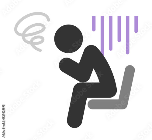 座って落ち込む人物