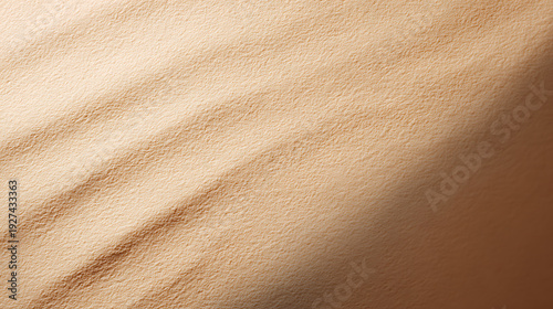 A close-up shot of sand dune texture creating a natural and abstract feel. The image showcases the organic patterns and textures of the sand dunes
