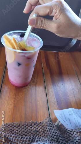 pouring milk into cup