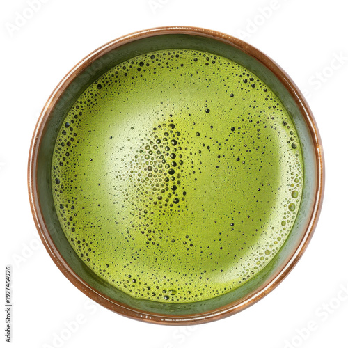 Frothy matcha tea in earth-toned ceramic bowl, top-down view isolated on white background