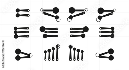 Collection of various black measuring spoons on white background for cooking and recipe design