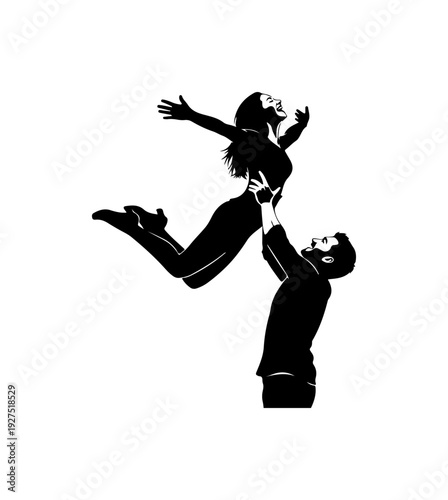 Man playfully lifting woman in joyful moment together