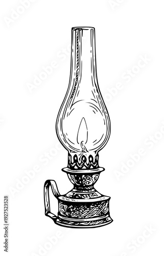 Vintage kerosene lamp with lit flame in glass chimney