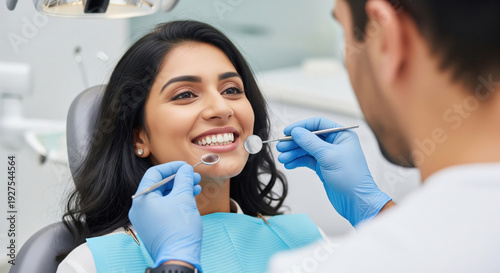 Happy patient getting dental check-up at modern clinic.