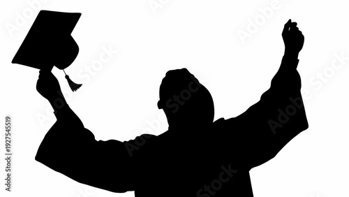 Graduate celebrating with mortarboard in triumph