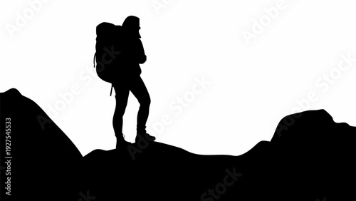 Hiker standing on mountain peak with backpack
