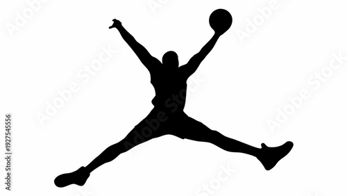 Dynamic basketball player jumping to score in mid air