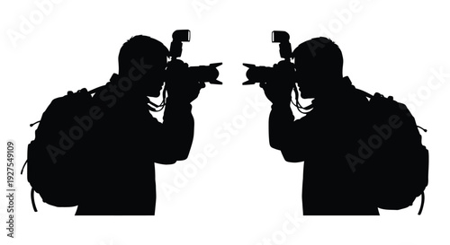Two photographers with cameras facing each other a striking black silhouette