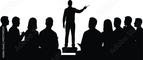 A silhouette of a man giving a presentation to a group of people