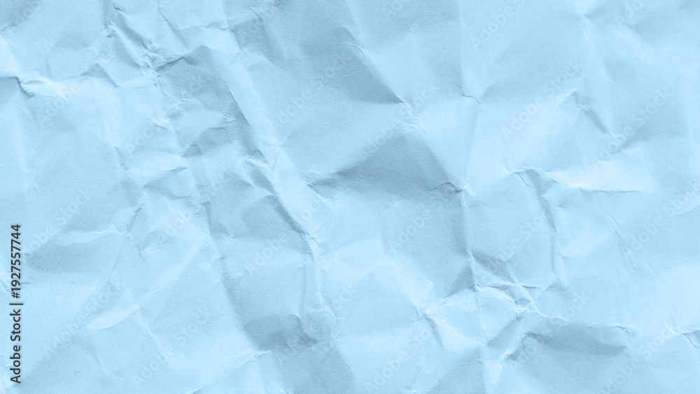 Fototapeta premium Crumpled Light Blue Pastel Paper Texture Background with Wrinkled Surface