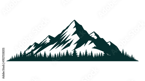 Majestic mountain peak rising above a dense forest landscape under a clear sky