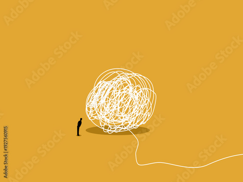 businessman analyzed and untangle the tangled mess