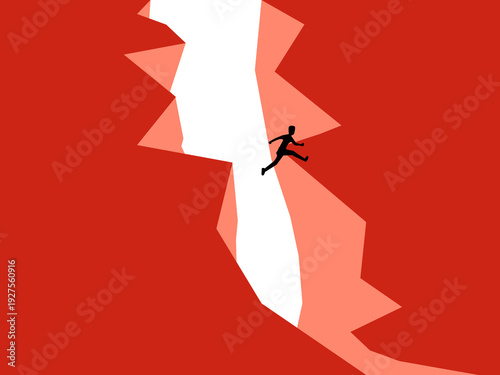 businessman jumps across a dangerous cliff gap.