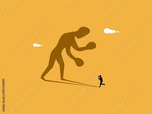 businessman battles his own shadow.