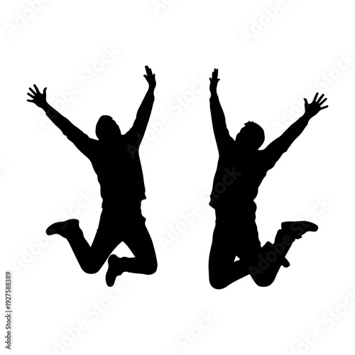 Silhouette of two people jumping with joy.