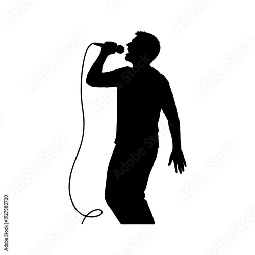 Silhouette of a Man Singing into a Microphone.