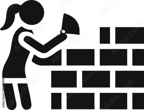 Diligent woman skillfully constructs a durable brick wall using traditional masonry tools