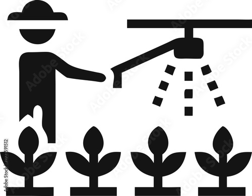 Farmer spraying multiple rows of plants with an overhead irrigation system