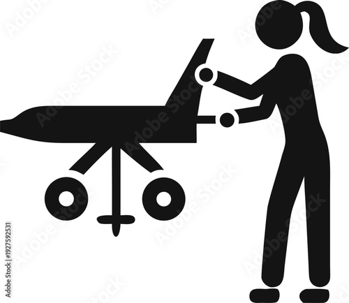 Female Ground Crew Member Pushing an Airplane on a Wheeled Cart for Airport Operations