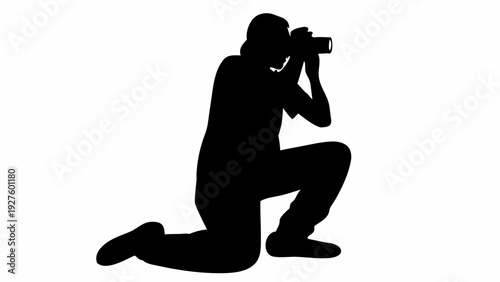 Professional photographer capturing moment on camera