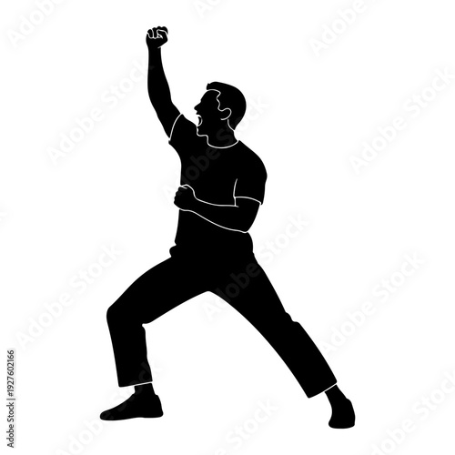 Silhouette of a man celebrating with fist raised.