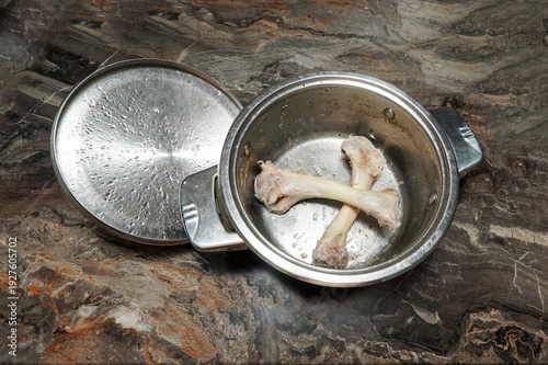 Photos Two meatless turkey drumstick bones lie at the bottom of the pan.