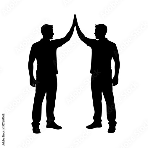 Silhouette of two men giving a high five.