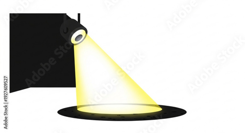 Spotlight shines bright yellow light on stage floor with black backdrop