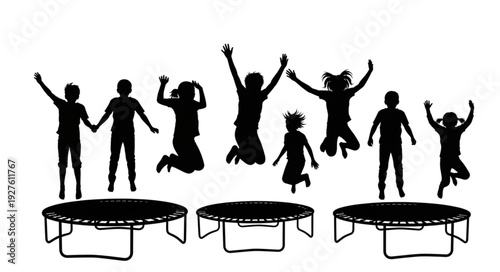 Children Jumping on Trampolines Silhouette.