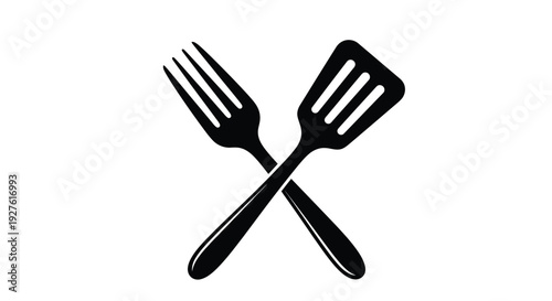 Black fork and spatula crossed on a plain white background