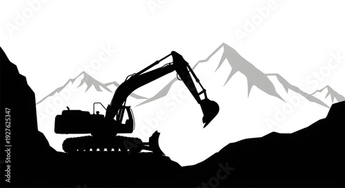 Silhouette of a heavy excavator machine working in a mountain landscape