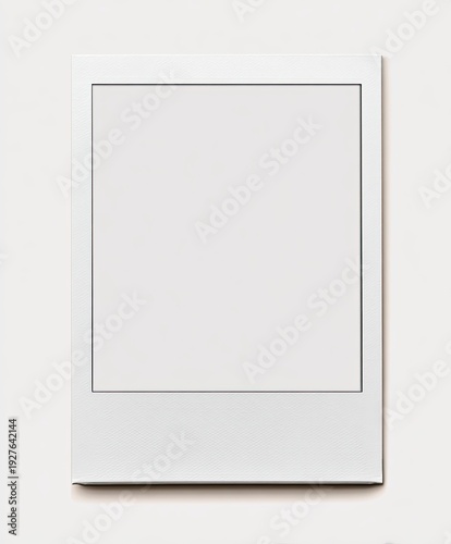 An isolated, square instant photo with a blank white interior on a white background