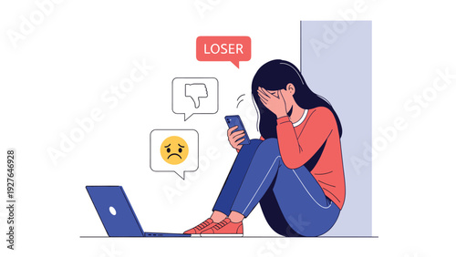 Sad teenage girl sits alone on the floor crying while looking at negative comments like loser and thumbs down on her laptop and smartphone.