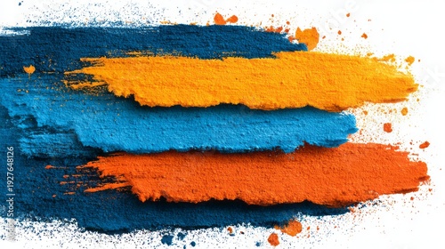 Bright streaks of blue and orange powders create a textured, artistic backdrop.
