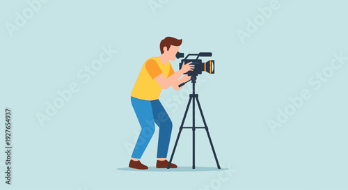 Man filming with a professional video camera on a tripod, documentary filming