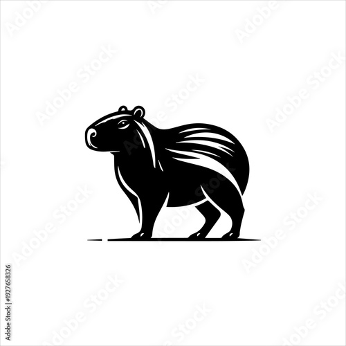 Capybara silhouette presented as a calm black vector emblem design. Wildlife animal icon concept
