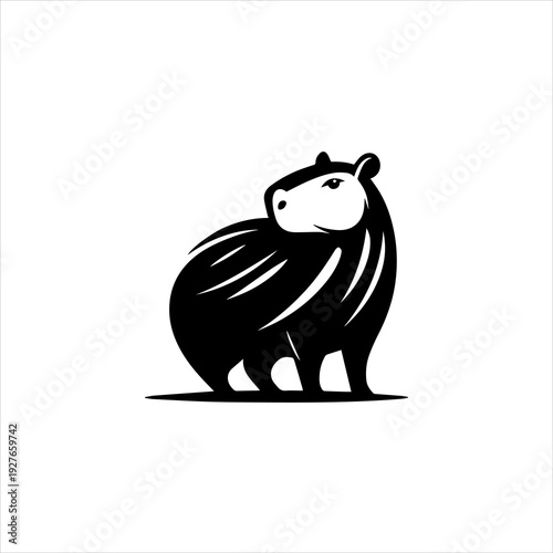 Capybara silhouette presented as a calm black vector emblem design. Wildlife animal icon concept
