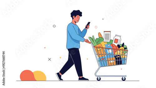 Young man checking his smartphone while pushing a shopping cart full of groceries in a supermarket for retail concepts.